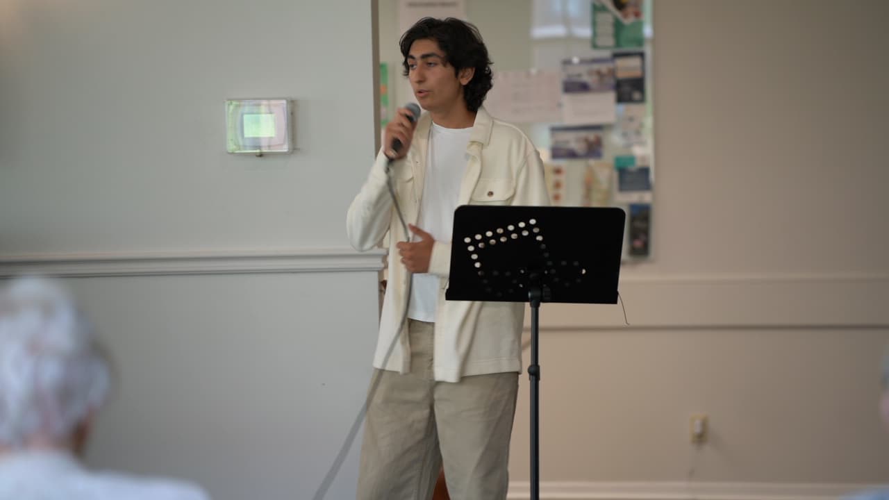 /assets/ishaan-singing.JPG