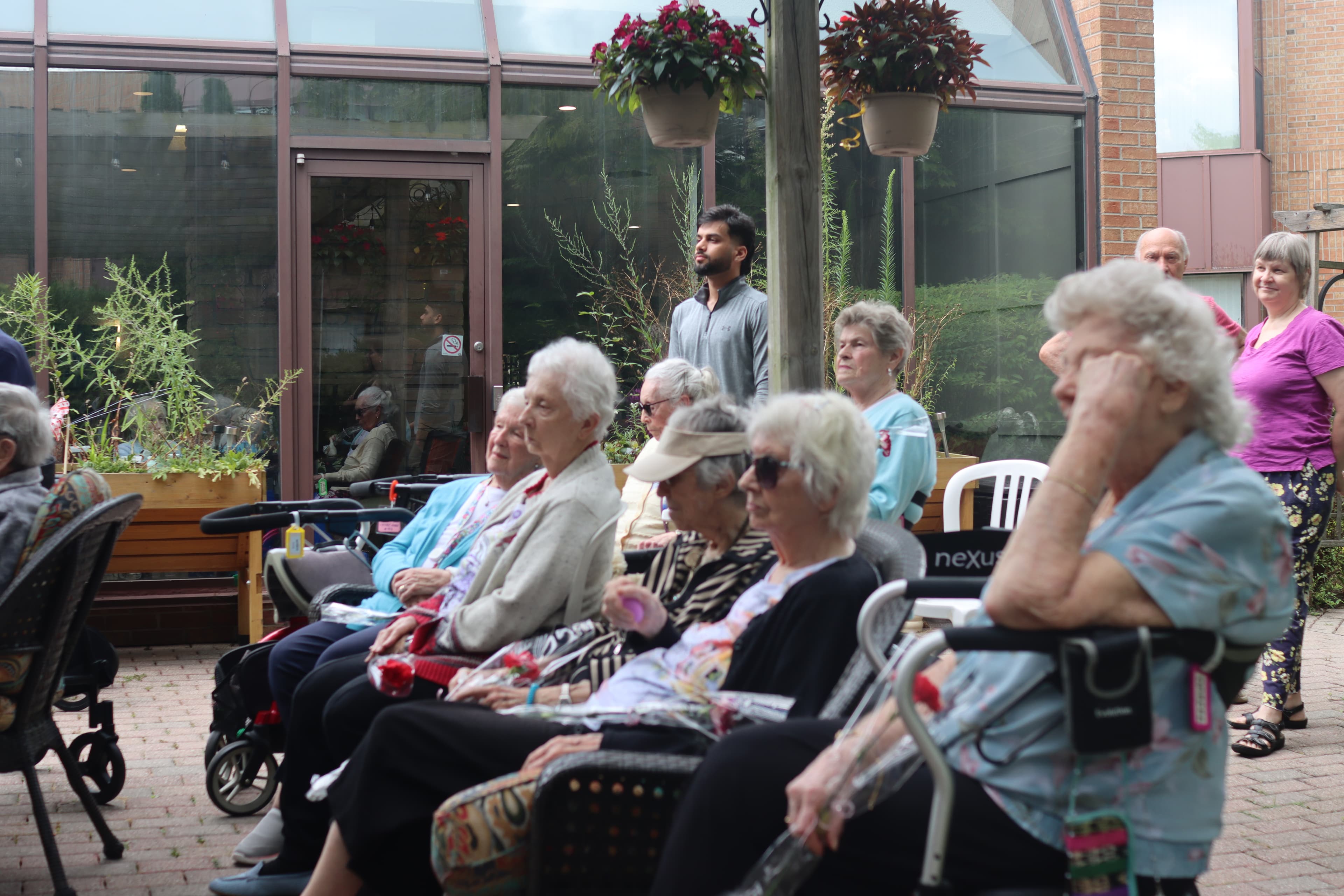 /assets/seniors-group-with-flowers.JPG