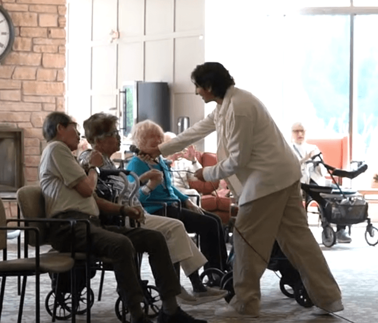 Student connecting with senior community members
